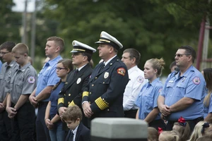 Missouri fire chief Ted Martin stands proudly with fellow first responders during a moment of recognition at College of the Ozarks.